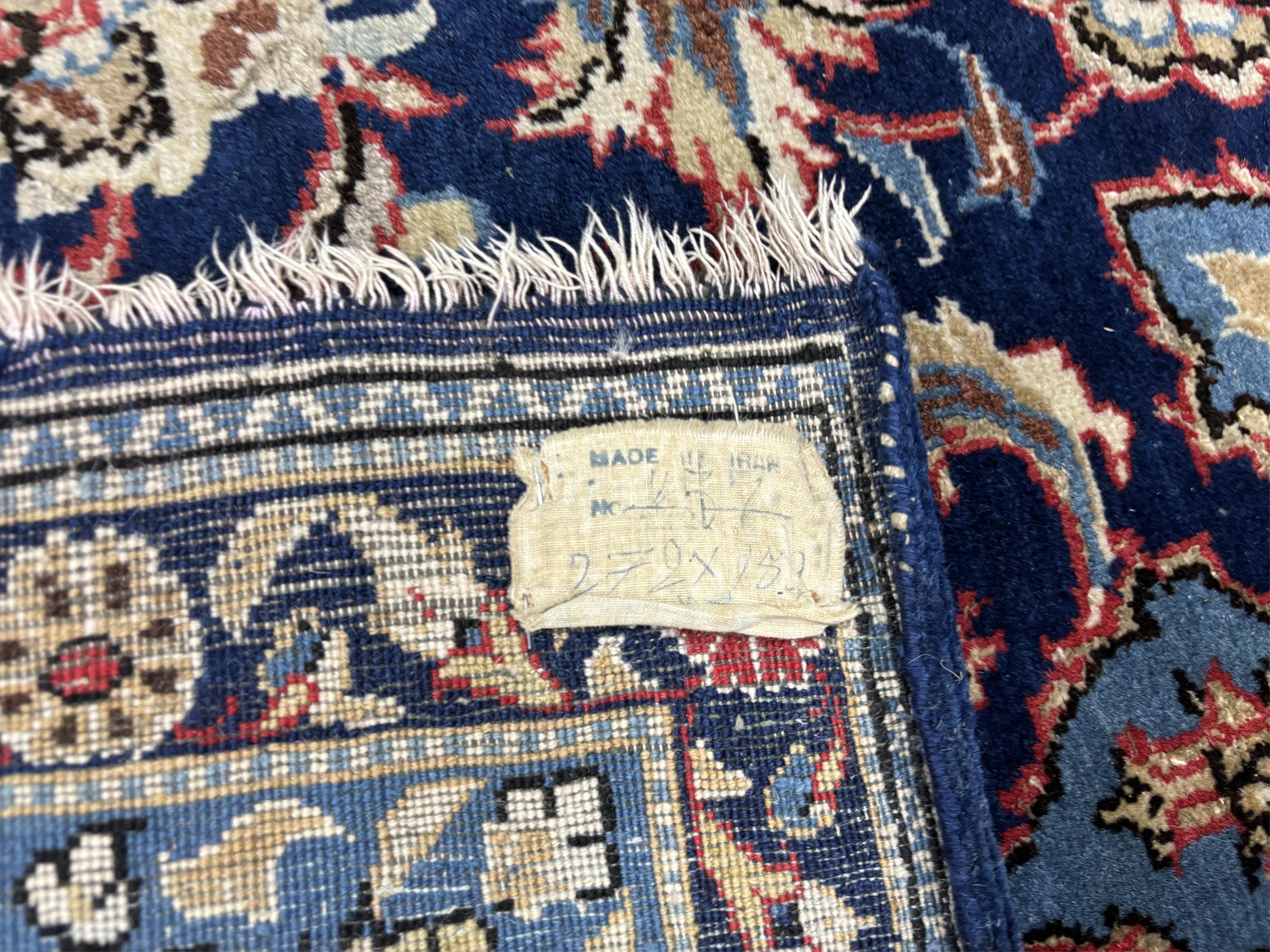 A North West Persian blue ground carpet, 270 x 158cm